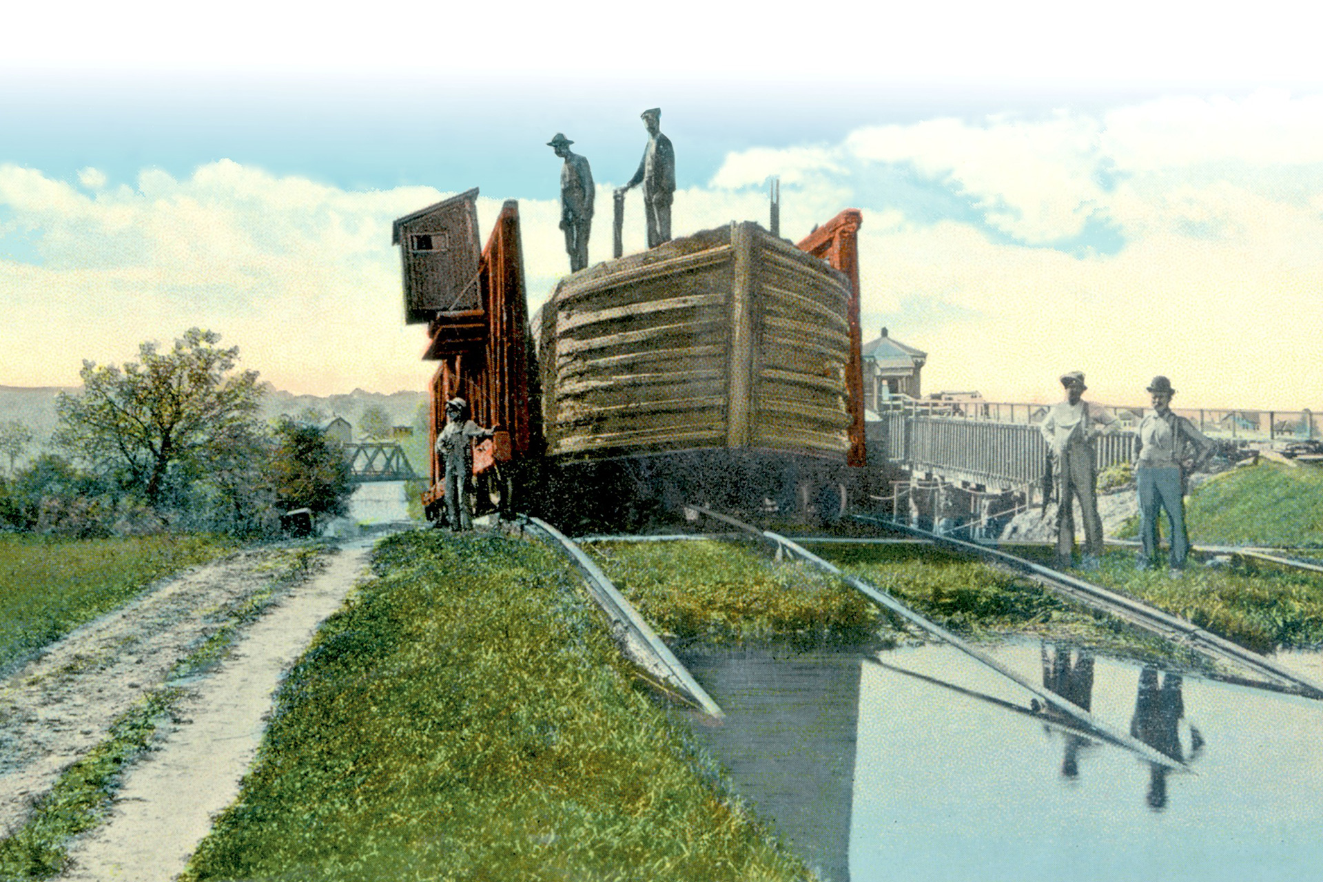 Stewartsville: This colorized image shows a canal boat at the head of Plane 8 West in Stewartsville. The bridge at the foot of the plane carried the DL&W RR.