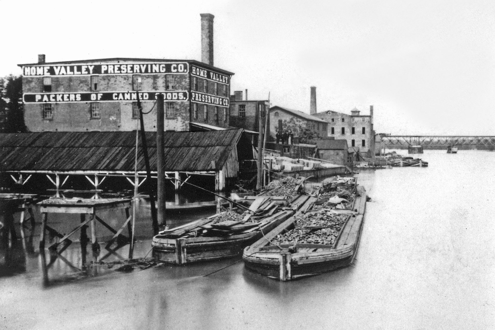 Two loaded boats are seen docked at New Brunswick, which was the northern terminus of the D&R.