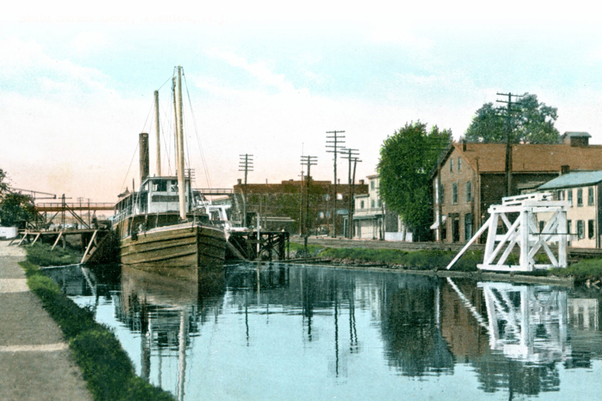 The steamboat F.W. Brune exits the State Street Lock in Trenton. The large locks on the Delaware & Raritan allowed boats of all shapes and sizes to navigate the canal.
