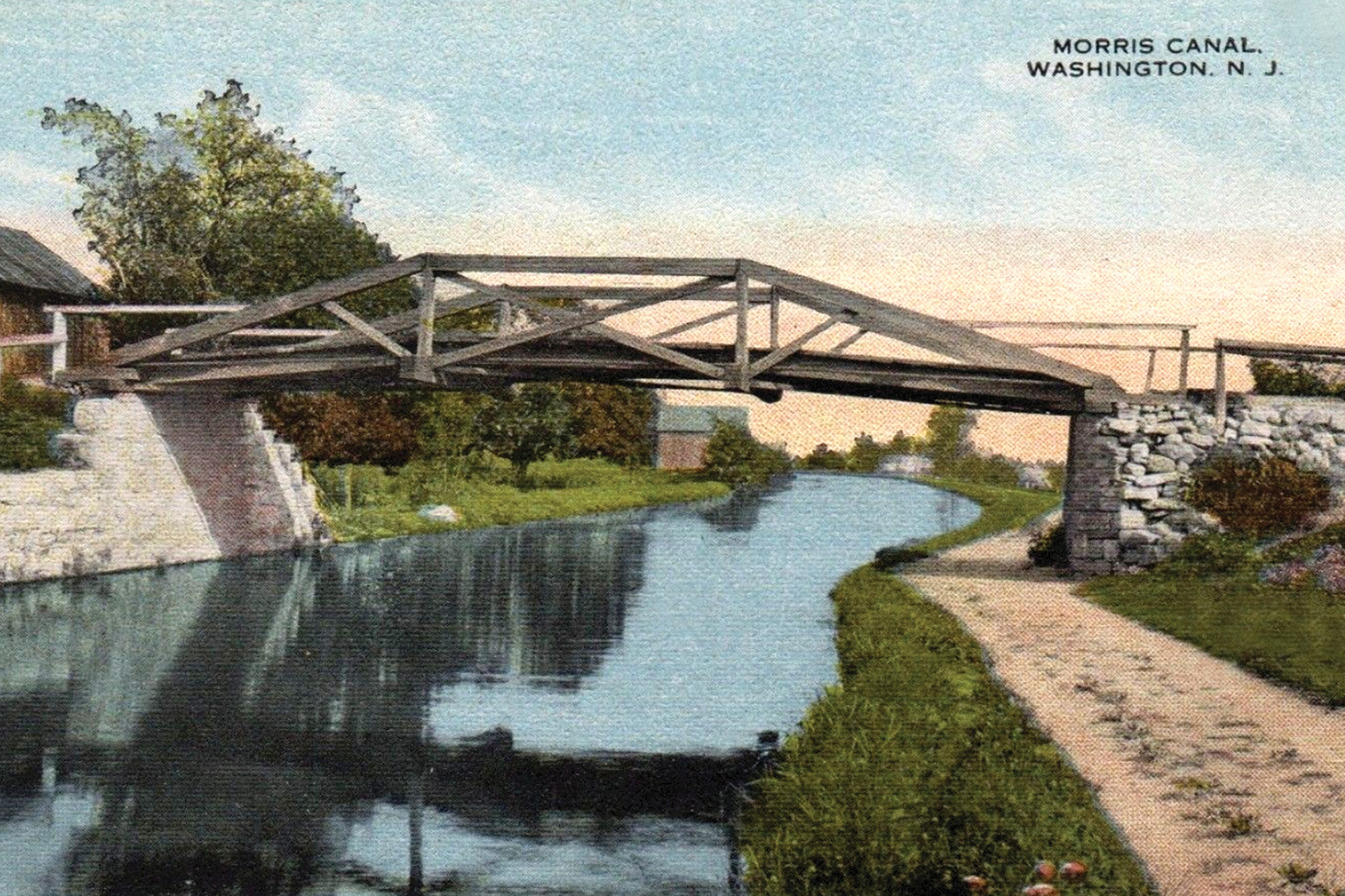 Washington Borough was a thriving Warren County port town along the Morris Canal, and Belvidere Ave was its main north-south thoroughfare. Looking east on the canal, we see the Belvidere Ave bridge crossing over.