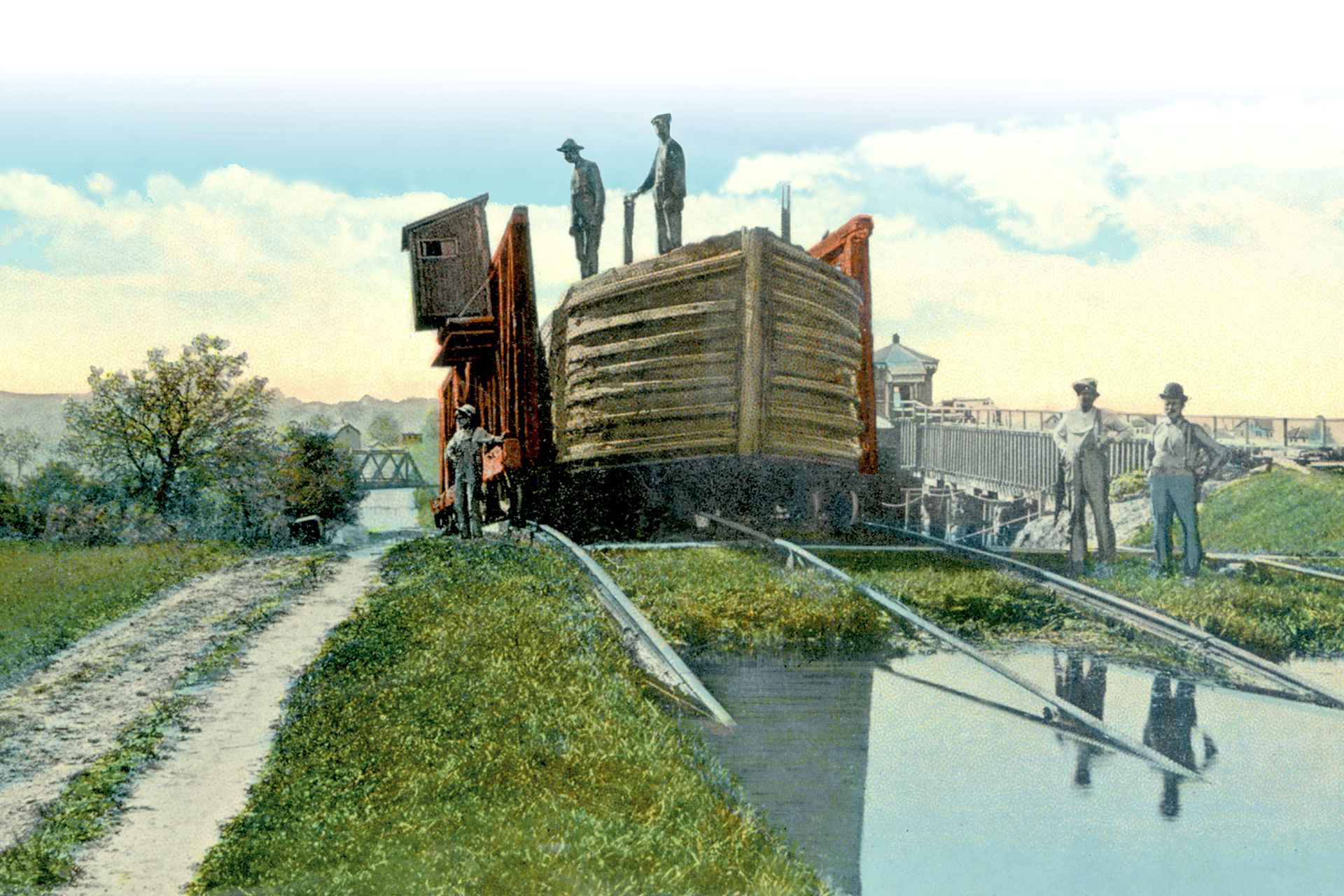 This colorized image shows a canal boat at the head of Plane 8 West in Stewartsville. The bridge at the foot of the plane carried the DL&W RR.