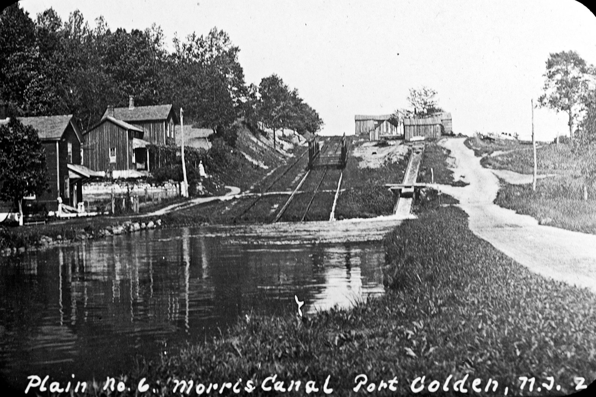 Plane 6 West in Port Colden was one of only three inclined plane that had a double set of tracks. By the time this photo was taken, the second set had been removed, but the sleeper stones are still visible on the left side of the plane.
