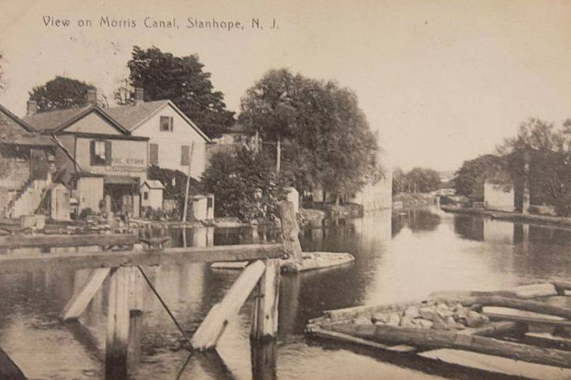 After exiting the cradle at the head of Plane 2 West, the boats followed the canal behind the Main Street buildings in Stanhope.