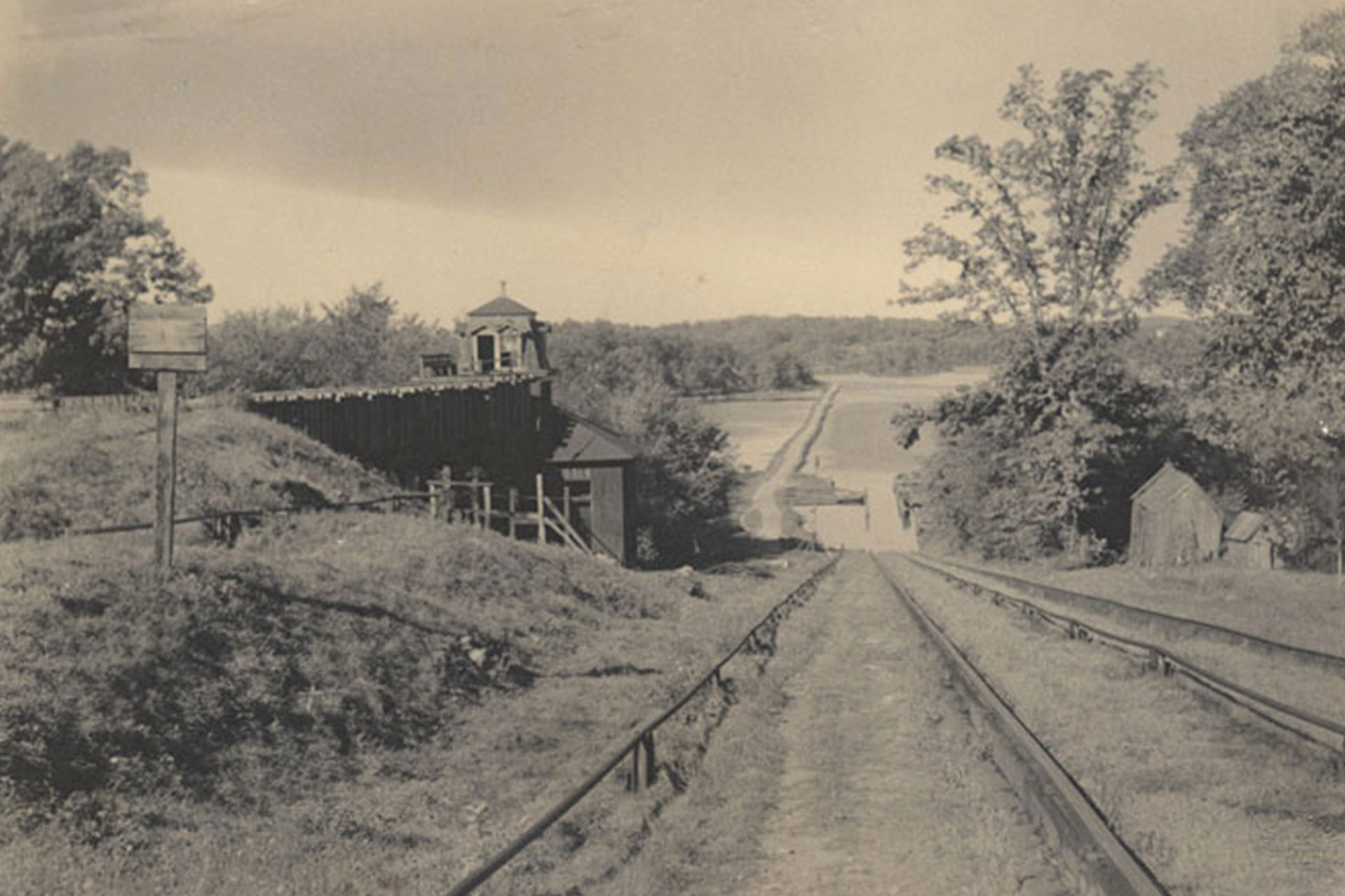 The towpath causway, seen in the distance, allowed boats to cross Lake Musconetcong to the foot of Plane 1 West, which raised boats to the canal’s summit level at Port Morris.