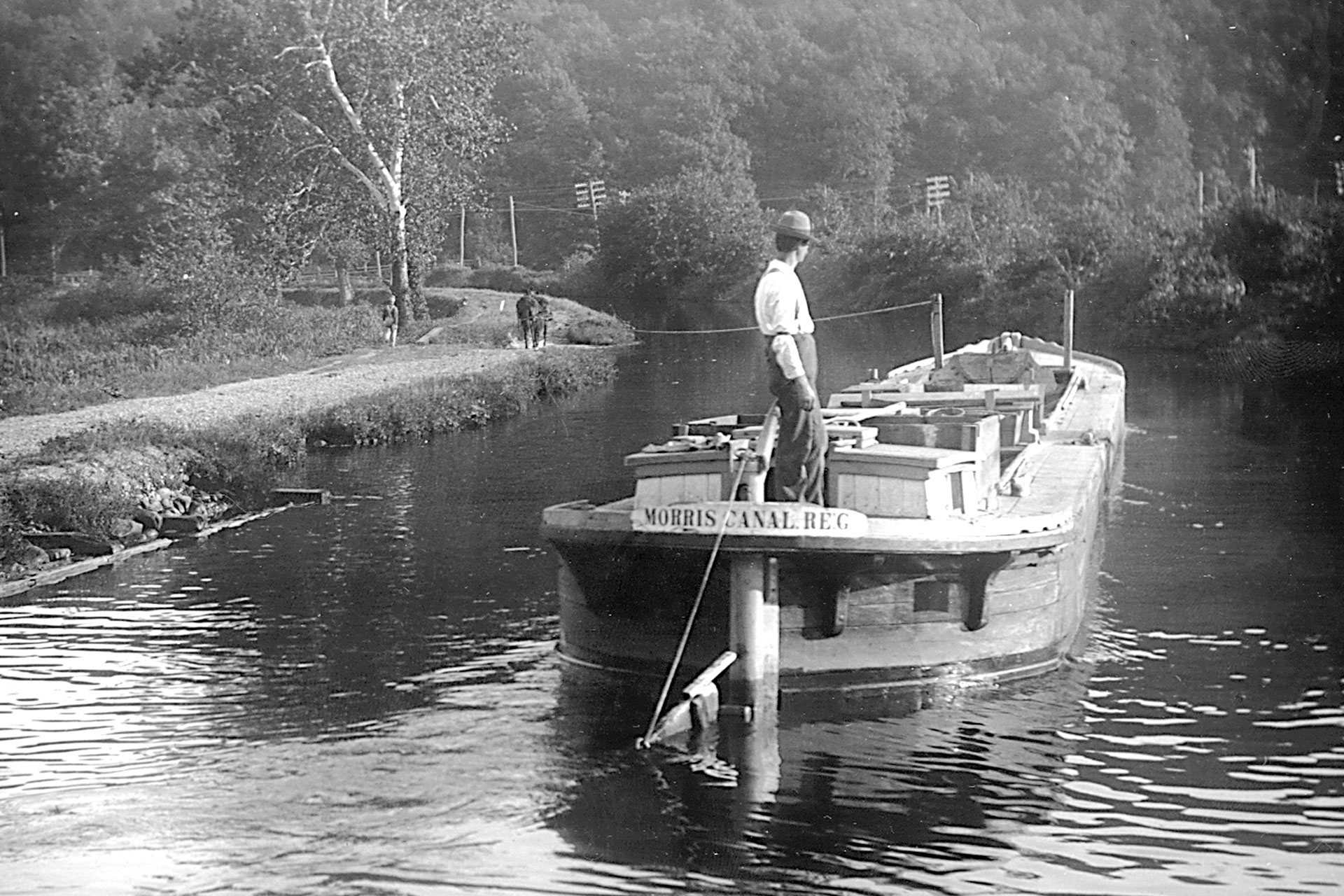 A minimum of two people were needed to operate a Morris Canal boat; a captain to steer and a tender to drive the mules along the path.