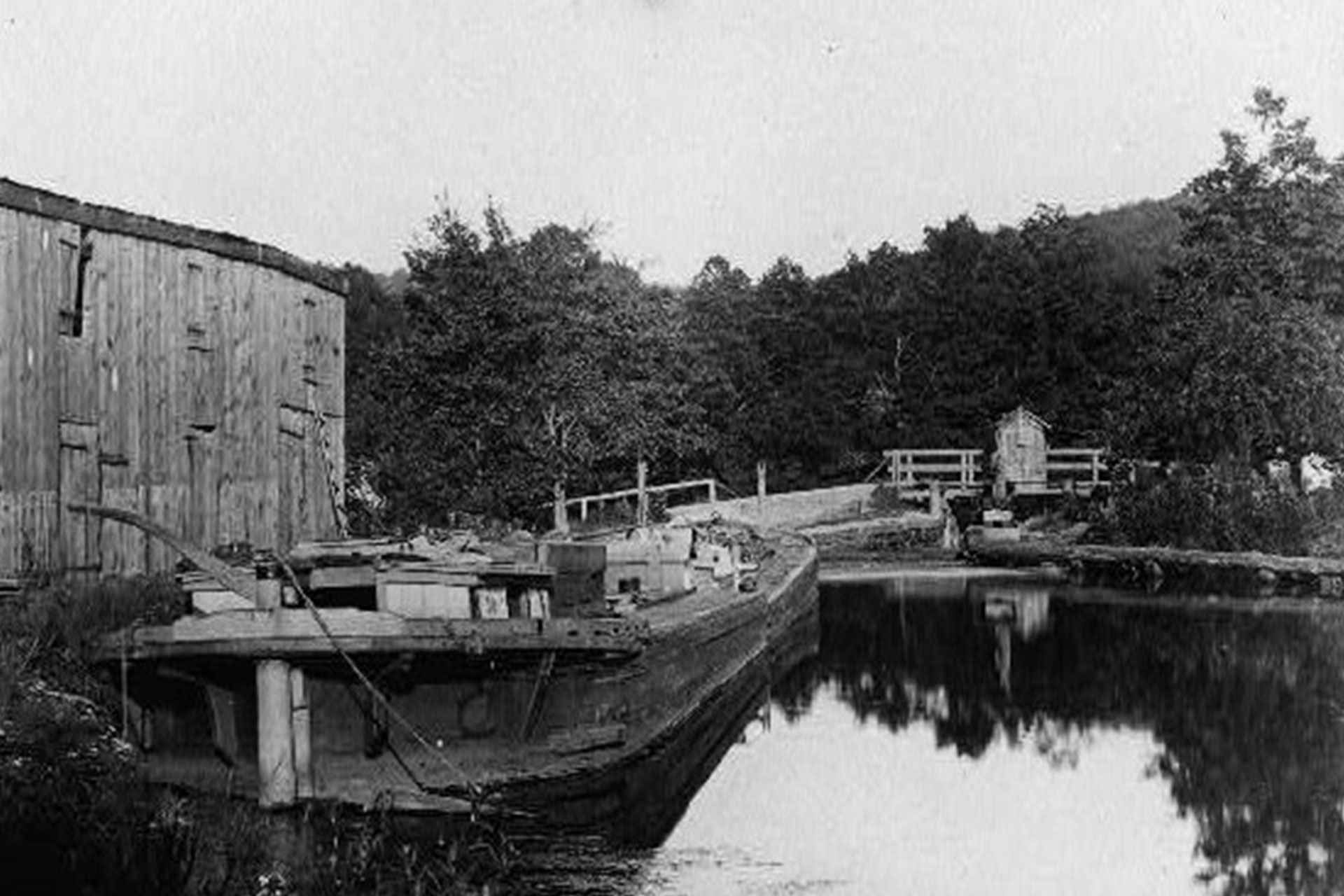 A Morris Canal boat is tied up at the head of Lock 9 East in Powerville.
