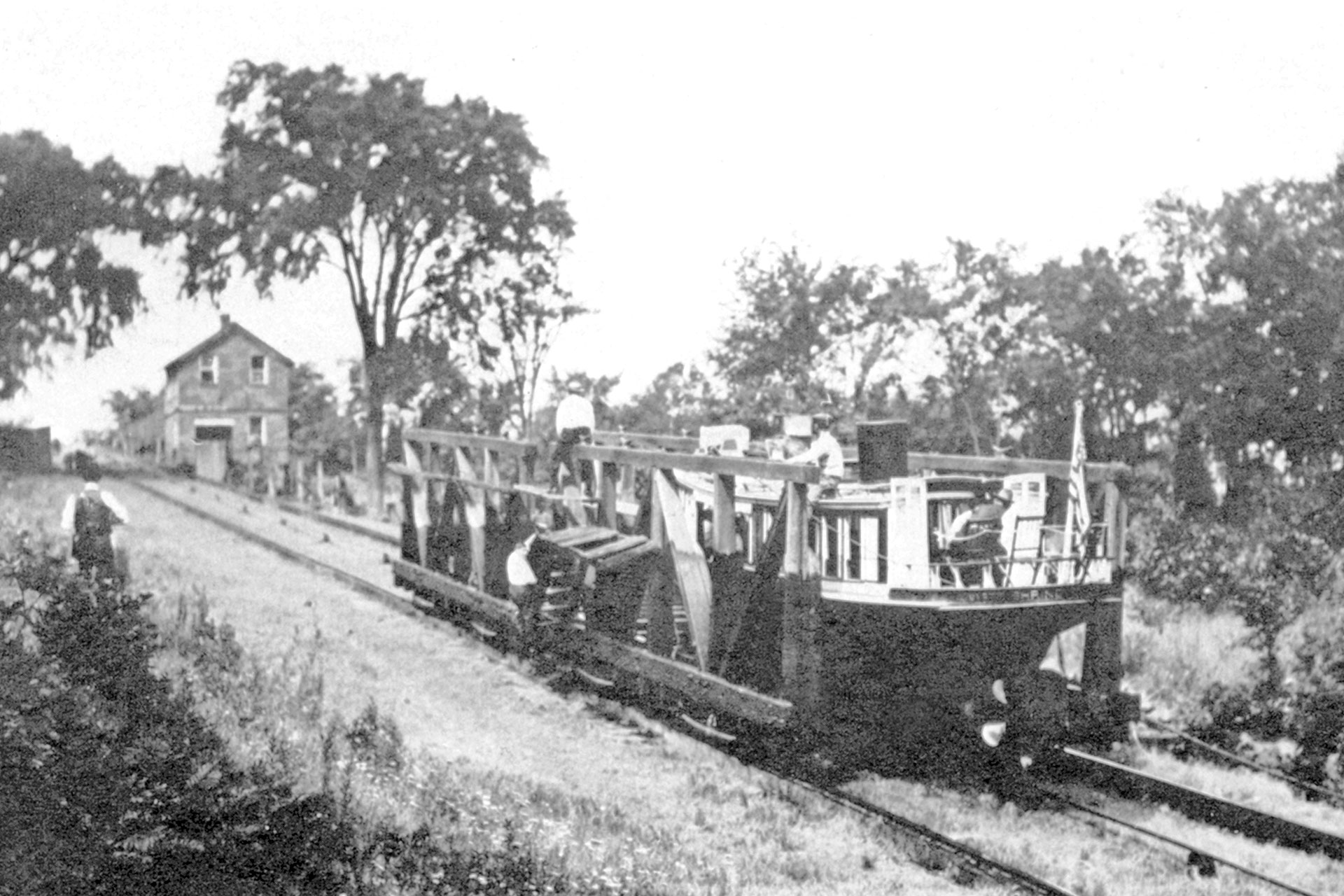 The inspection boat the Mystic Shrine ascends Plane 10 East into Beavertown, which later was renamed Lincoln Park.