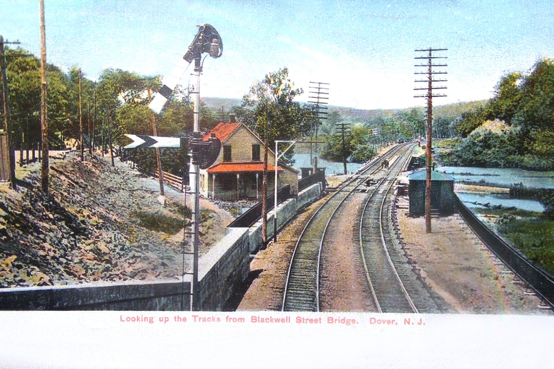 The DL&WRR passes over the Morris Canal and Rockaway River in Dover. A swing bidge allowed canal boats to pass under the rails.