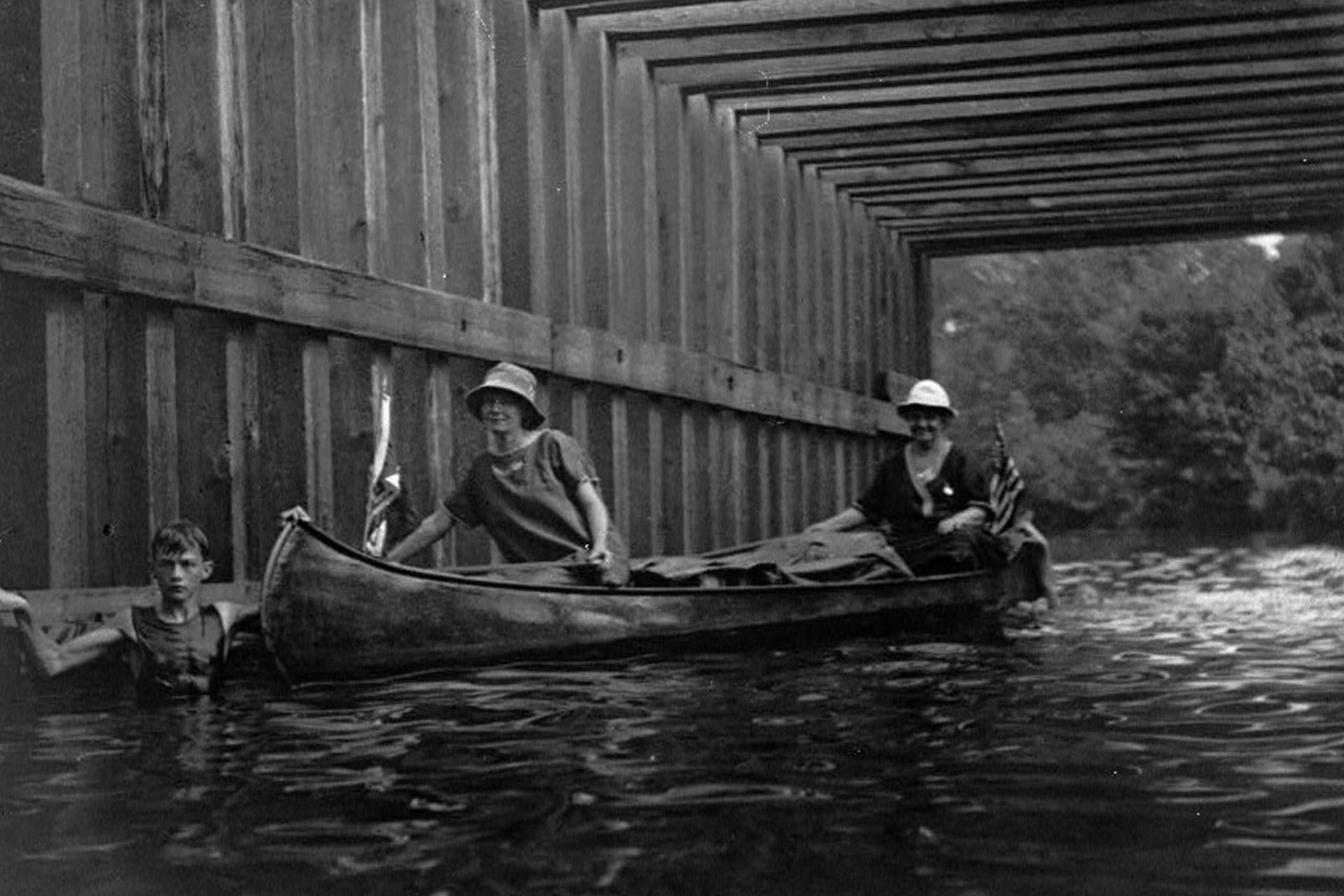 This view inside the aqueduct shows canoeists and a swimmer having fun on a summer’s day. After cargo traffic dried up, the canal was mostly used for recreational pursuits.