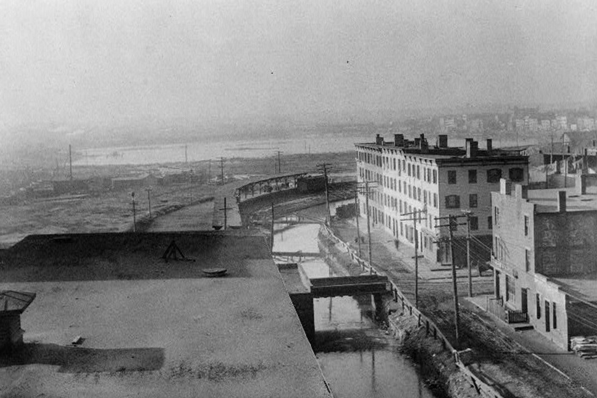 Taken from high atop a building by the basin, this view looks west as the canal winds it way through Jersey City.