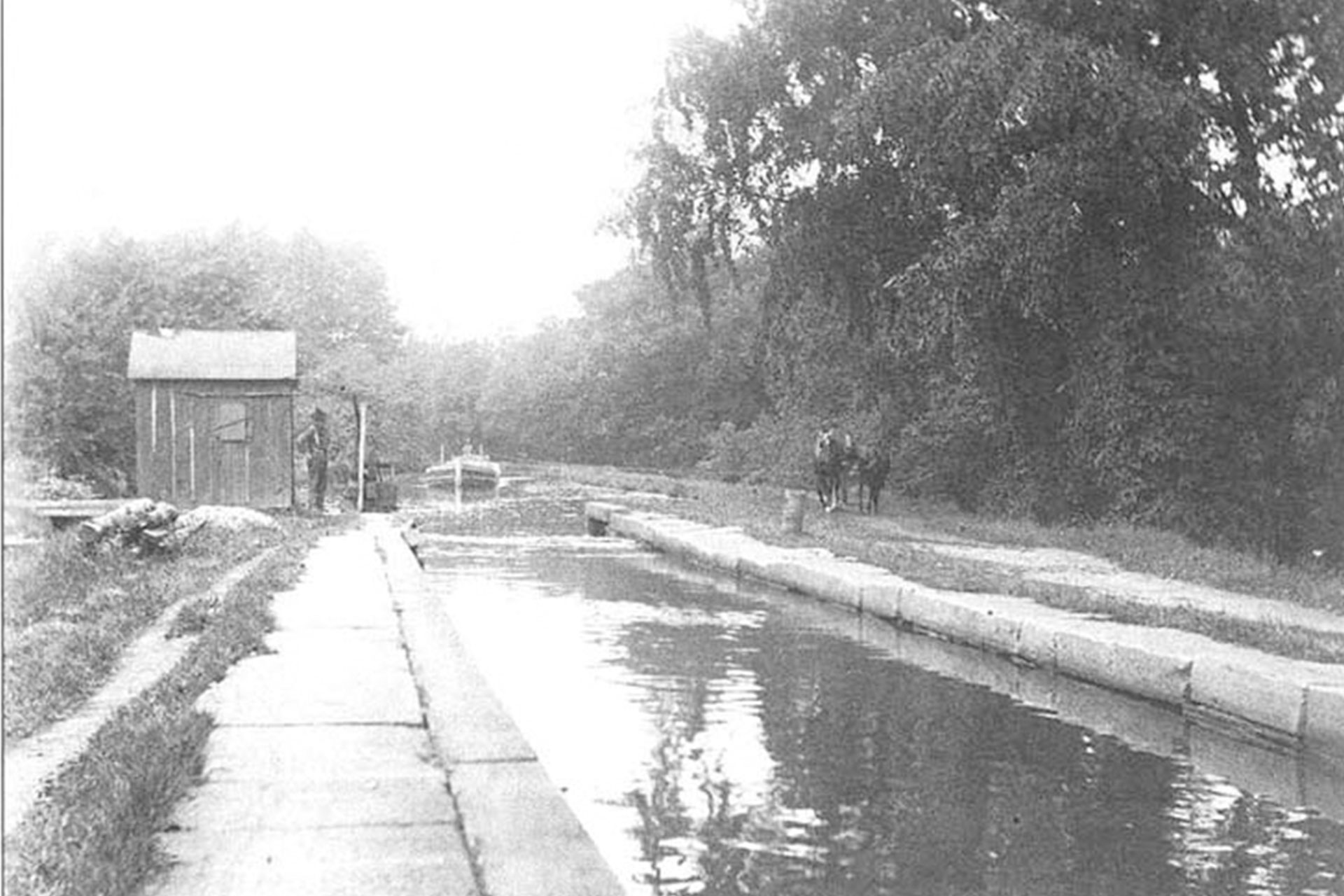 A boat approaches Lock 3 East in Dover, which was one of two locks located along Princeton Avenue.