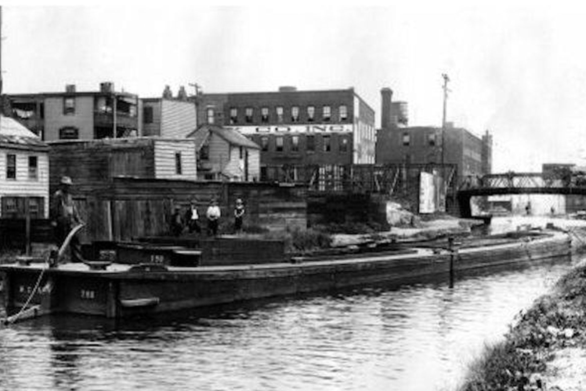 A canal boat approaces the head of Plane 12 East in Newark.